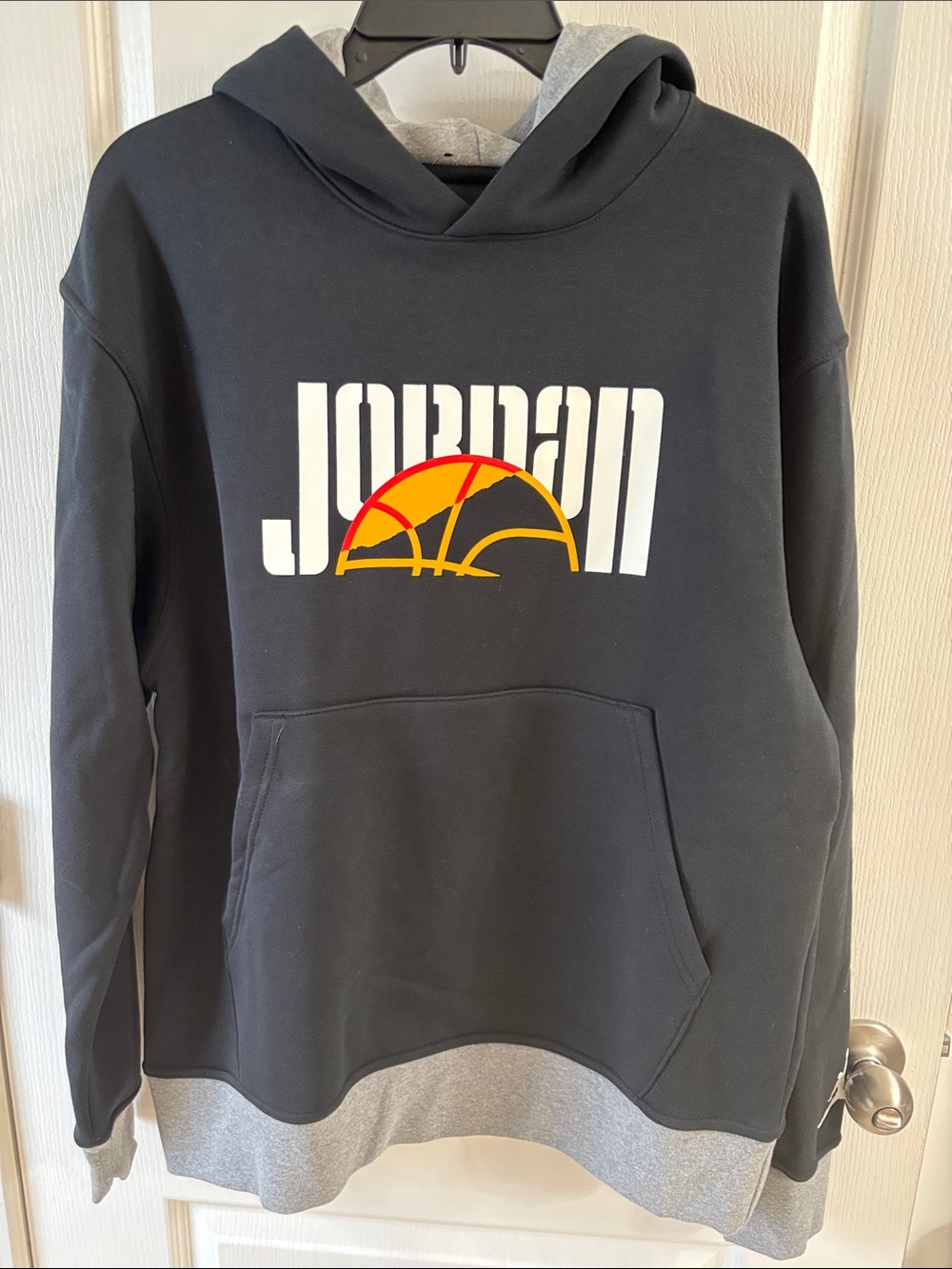 Jordan Men's Black Hoodie with White Logo and Red-Yellow Graphic